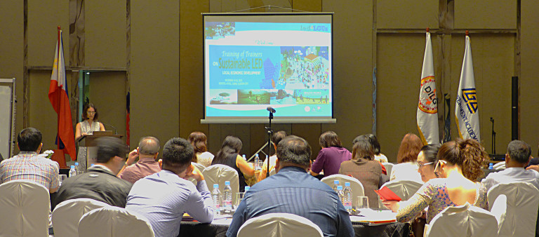 Participants from the academe listen to an Opening Message by Genevieve Asselin of the Embassy of Canada in Manila during the first day of the Training of Trainors on Sustainable Local Economic Development held in Manila from 14-18 December 2015 for Local Resource Institutes.