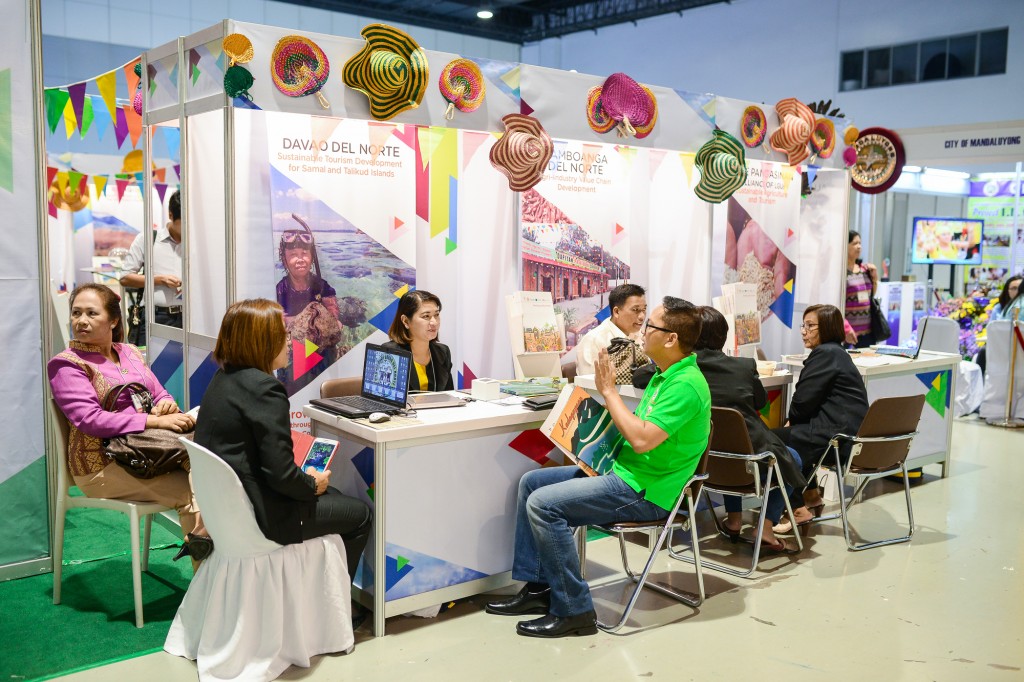 Potential Investors interact with Local Economic and Investment Promotion Officers to find out more about investment opportunities in different localities during the business-matching session of the Fiesta Forward Tourism Investment Forum held September 1, 2015 at the SMX Convention Center, Pasay City.